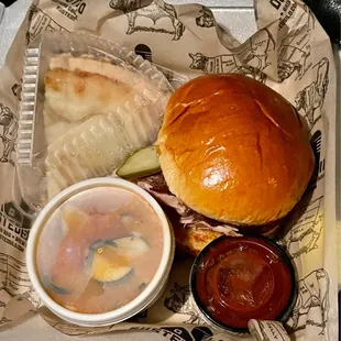Pork sandwich, trying the cucumbers and tomatoes, and added sugar cream pie!