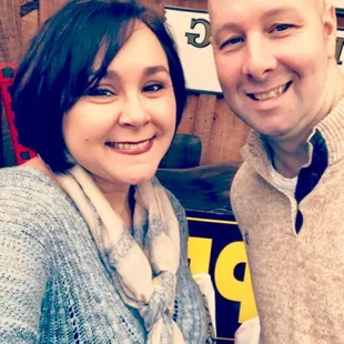 a man and a woman posing for a picture