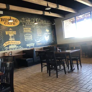 Tables and seating. Booths and tables. Large space.