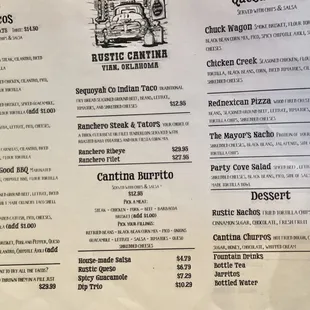 a hand holding a menu