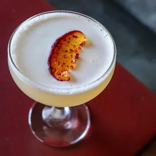 Beelzebubba cocktail with fig infused bourbon, RC calpico, salted plum honey,
lemon oleo and fresh lemon