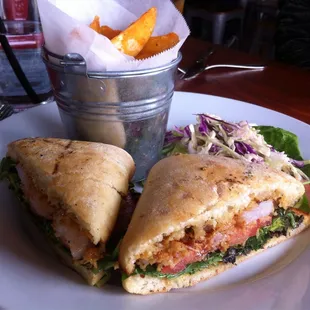 Fried Shrimp Po Boy Sandwich (Iceberg Lettuce, Tomato, Topped w/Grainy Mustard Remoulade, Fresh Baked Baguette, $14.95)
