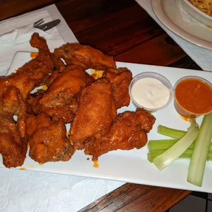 Breaded buffalo wings w extra sauce and blue cheese
