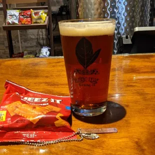 a pint of beer and a snack