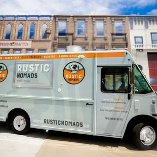 a food truck parked in front of a building