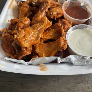 Dozen Hot Wings Xtra Sauce and side of Ranch