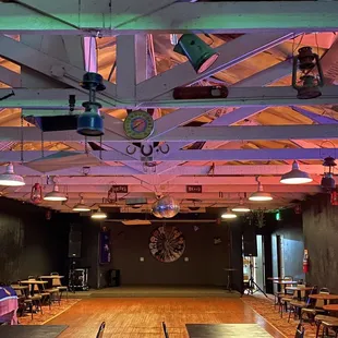 a large room with tables and chairs