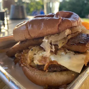 Heidleburger- burger with sauerkraut and brat on top