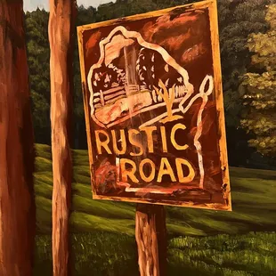 a rustic road sign