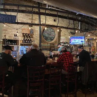 people sitting at the bar