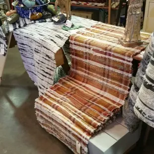 Check out these great rugs! All are made from found materials at the Rustic Vintage Rose in the West Bottoms, First Friday weekends.