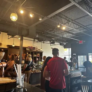 Inside the coffee shop facing the bakery area and door