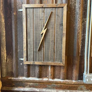 a picture of a window with a lightning bolt on it