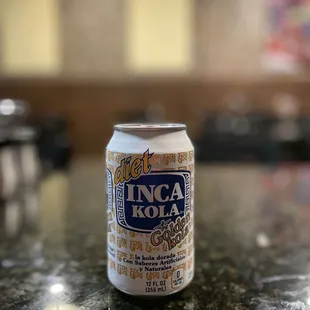 a can of beer on a counter