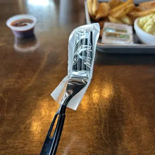 a person holding a fork and knife