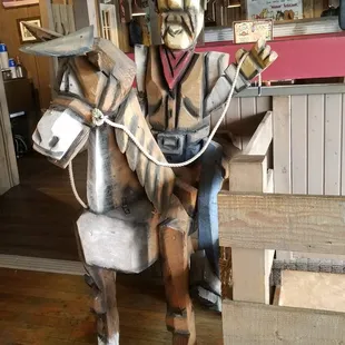 a statue of a cowboy on a horse