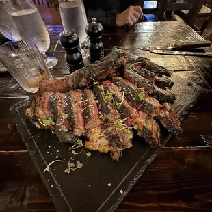 beautiful tomahawk steak. must have. we come here all the damn time and it is so good.