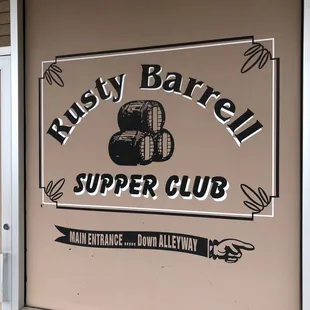 a sign for rusty barrell supper club