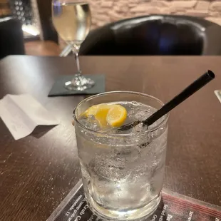 Tito's and soda water with a couple of lemon wedges... they make amazing drinks!