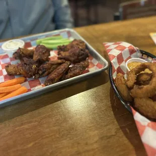 Wings w special raspberry chipotle sauce + onion rings