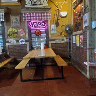 The seating are wooden benches. Very retro.