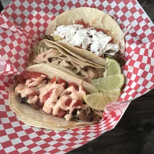 Beef, chicken and pork tacos