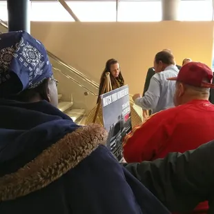 They drew for $10,000 and the Lady in the blue head scarf won.