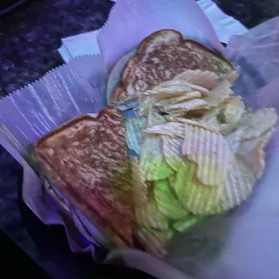 Grilled Turkey and cheese, comes with chips