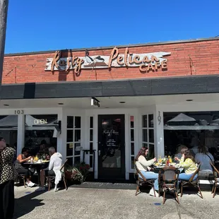 Entrance with some outdoor patio seating