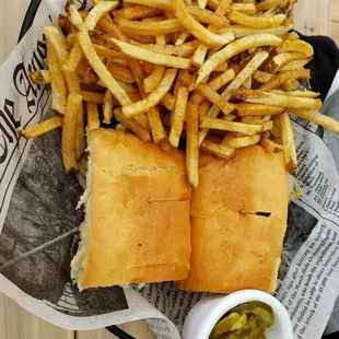 a basket of fries and a sandwich