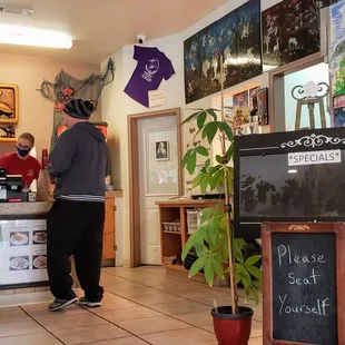 a man standing in a restaurant