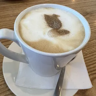 Cute pelican on the cafe au lait