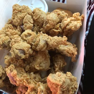 Gizzards and gravy and there is a biscuit down there somewhere.