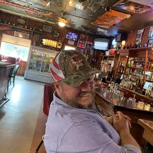 a man sitting at a bar
