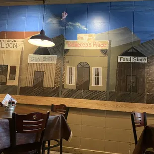 a reflection of a building on the wall