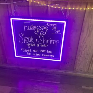 a neon sign for a restaurant