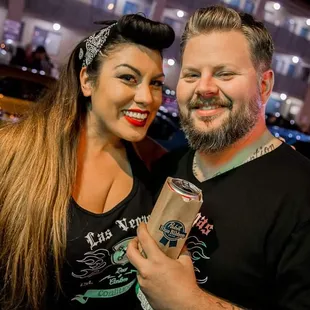 a man and woman posing for a picture