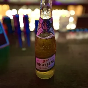 a bottle of beer on a table