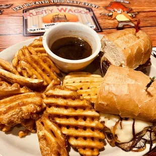 Philly Cheesesteak with waffle fries. So delicious. The grilled onions on this sandwich though.