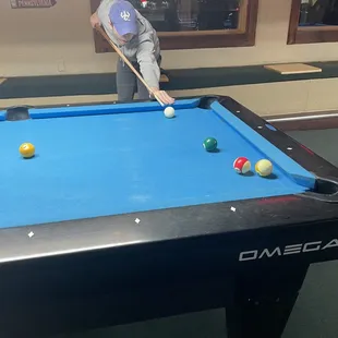 a man playing pool