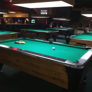 billiards tables in a bar