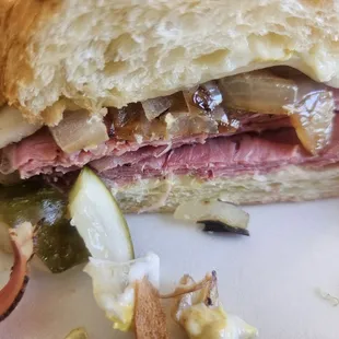 Create your own sandwich: Pastrami and corn beef on a croissant  with grilled onions, pickles, mayo, and mustard