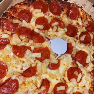 Thin crust Pepperoni and pineapple pizza
