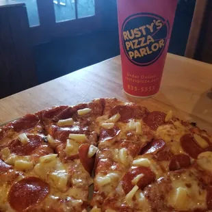 Pepperoni and pineapple pizza.