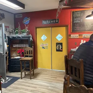 a man sitting at a table in a restaurant