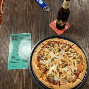Canadian bacon, pineapple, mushroom and jalapeño pizza