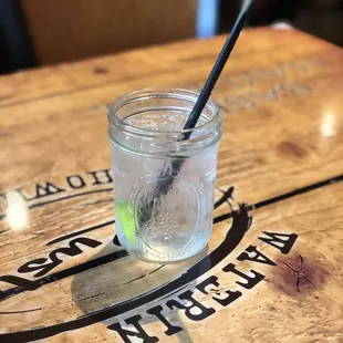 Vodka soda in a mason jar.