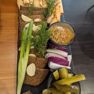 Salo = (4.5) Very Good &amp; Shareable! The pork fat is sliced and rolled up, tastes like bacon;)