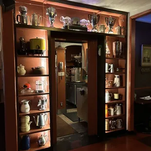 Old coffee, pots and tea pots are highlighted as decor throughout the restaurant