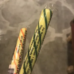 two candy wrapped in plastic wrap